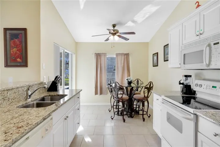 The Kitchen has an eat in Dining Area with views over the pool deck