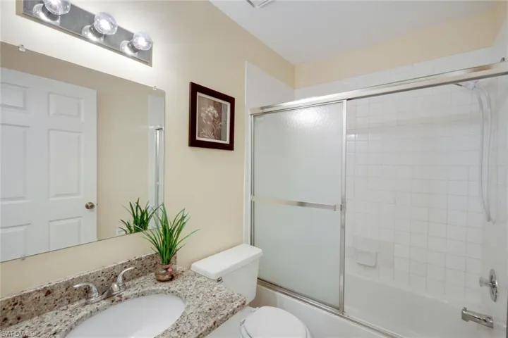 Guest Bathroom with Bath Tub/Shower Combo + single basin + toilet