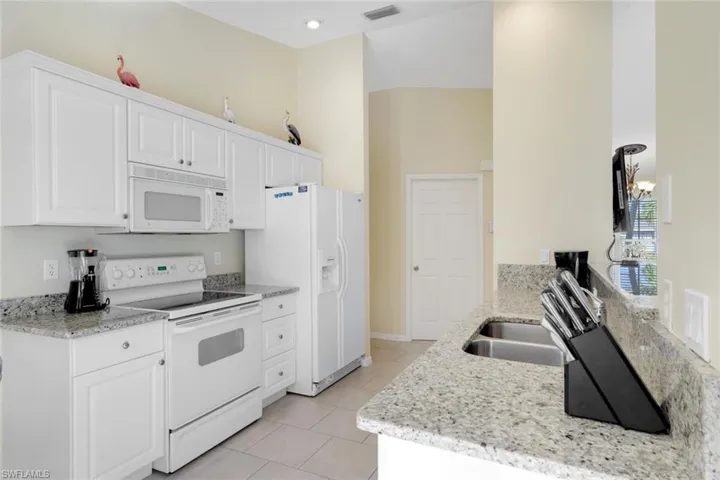 The Kitchen features granite counter tops