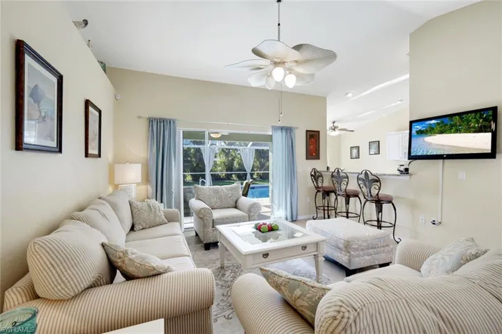 The Living Room with views over the west facing pool deck