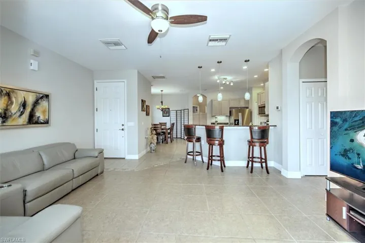 Lighted ceiling fan and gorgeous tile floors!
