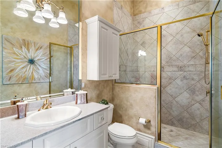 3rd ensuite bath has walk in shower.