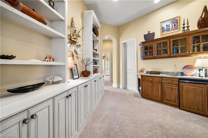 This seating area also offers lots of built ins along the back wall.