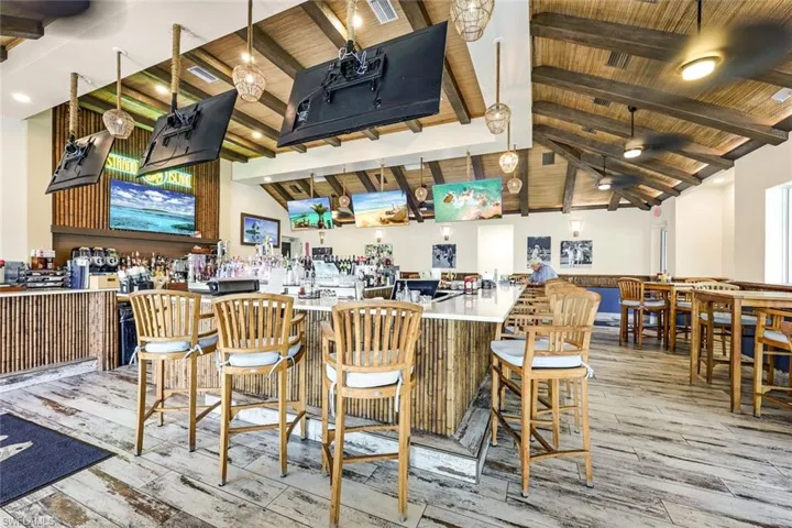 indoor bar area- multiple restaurants and activities on site! Tour the clubhouse Golf and amenities when you visit!