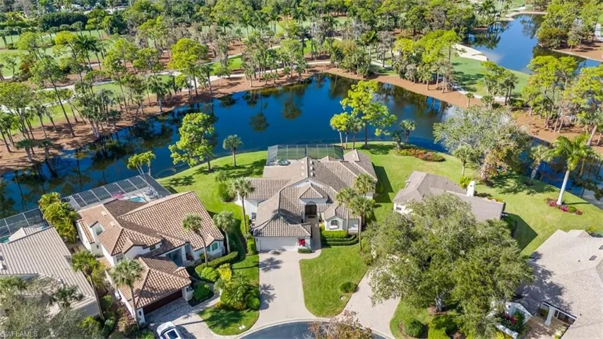 Aerial view of residential area with a large body of water
