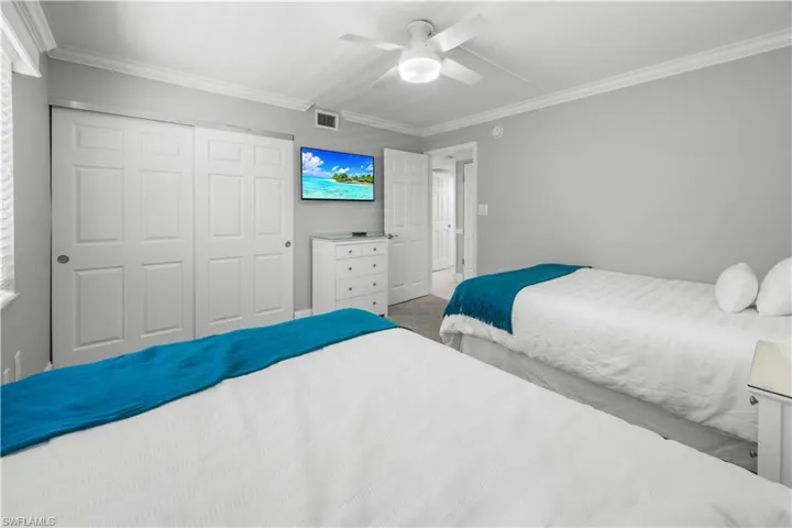 2nd bedroom with two queen size beds.