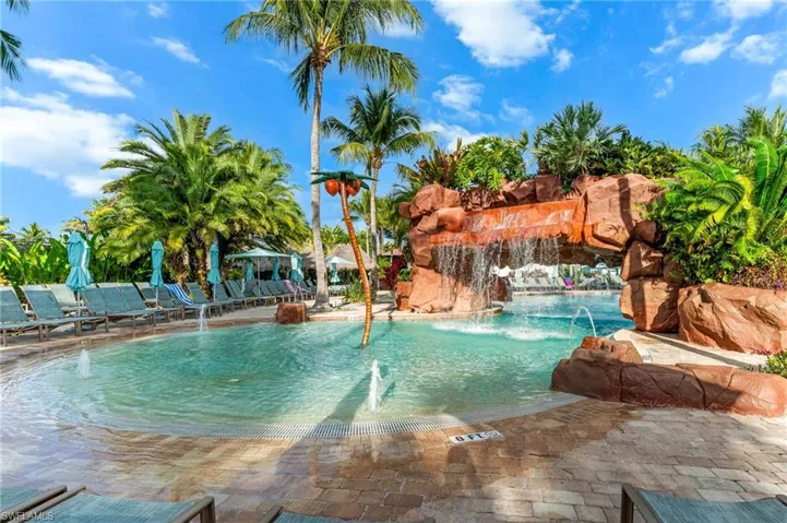 Community pool featuring a patio and a gazebo