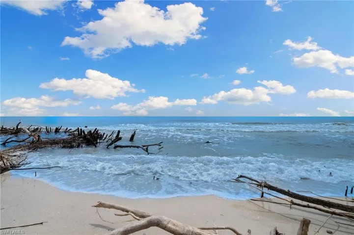 Property view of water with a beach view