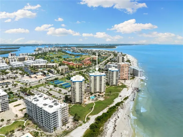 Bird's eye view featuring a view of the beach and a water view