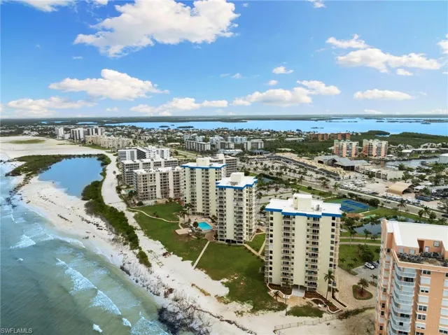 Aerial view with a view of the beach and a water view