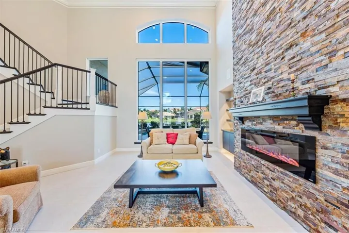 WOW Entrance 25 ft 3D Stone fireplace. Soaring Ceilings.