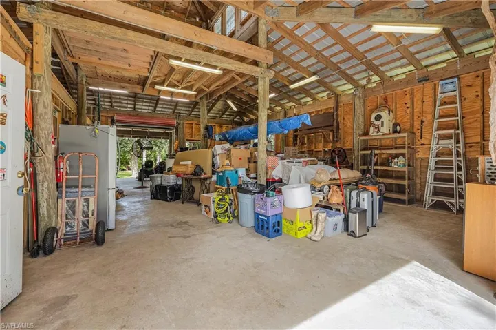 Garage featuring refrigerator