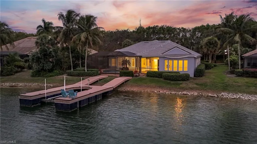Dock and house at dusk