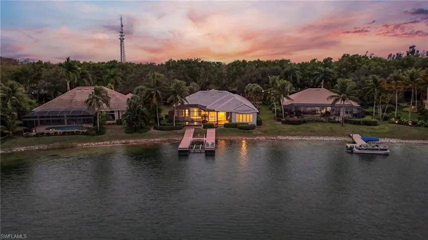 Sunset aerial view of back of home