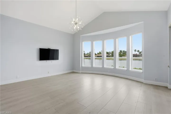 Bright Bonus Room with Volume Ceiling