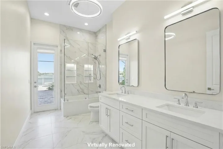 Virtually Renovated Bathroom 2 with access to lanai