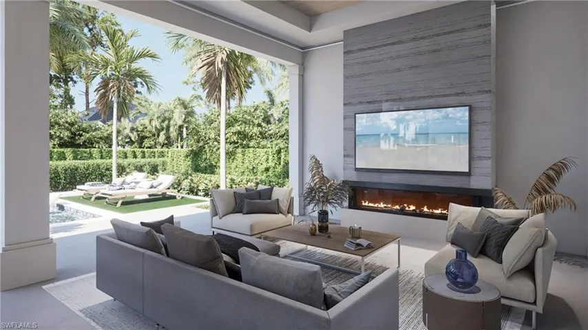 View of patio with an outdoor living space and ceiling fan