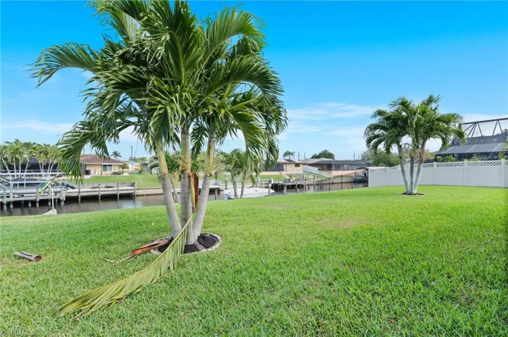 View of yard with a water view