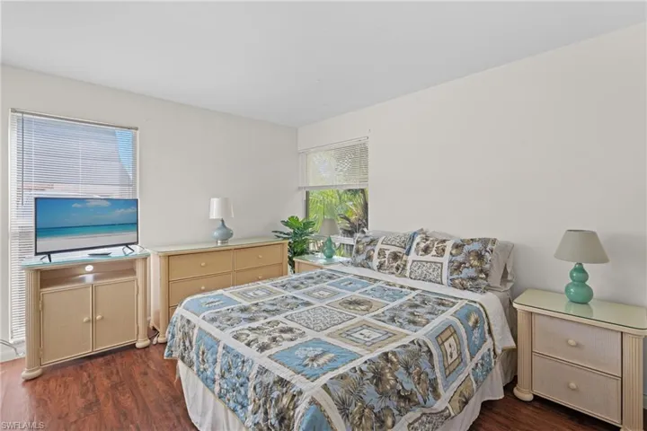 Bedroom featuring dark hardwood / wood-style flooring