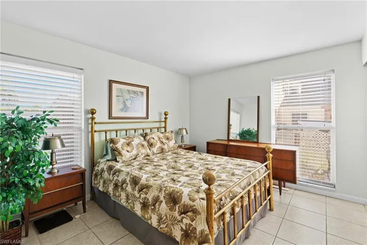 Bedroom featuring light tile patterned floors