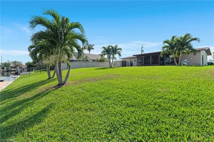 View of yard with a water view