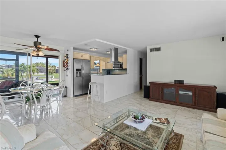 Living room featuring ceiling fan