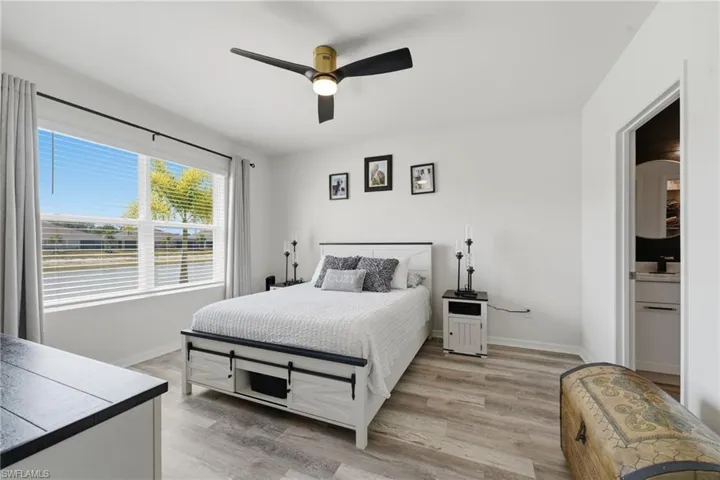 Wake up to lake views from your primary bedroom.