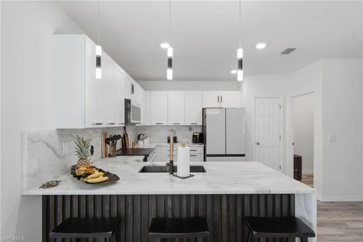 High end finishes in the post builder upgraded kitchen.