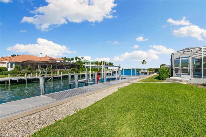 Waterfront looking Towards the Marco River, Large Dock, Lift, and Second Slip for Another Watercraft