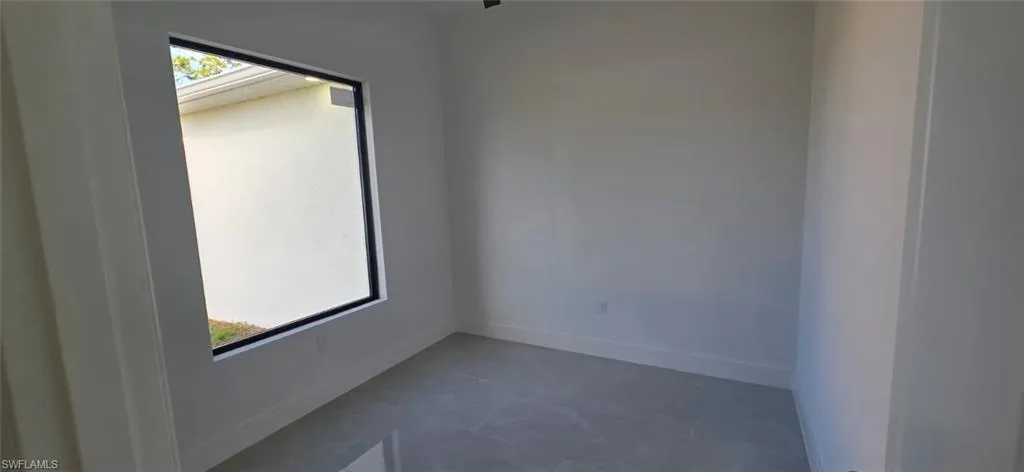 Spare room with baseboards
