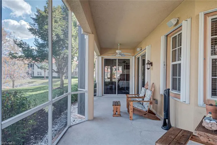 Sunroom featuring a ceiling fan