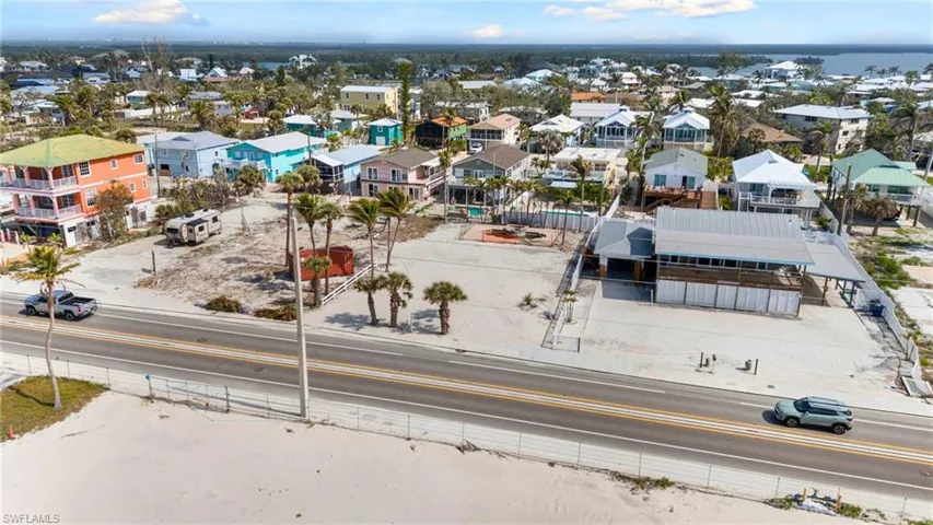 VIRTUALLY ENHANCED Birds eye view of property featuring a residential view