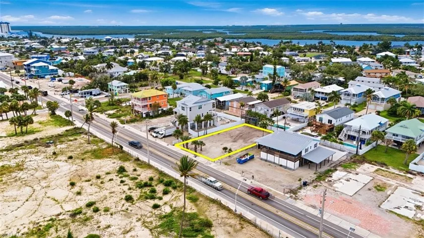 VIRTUALLY ENHANCED - Cleared lot with direct road frontage, surrounded by established residential properties