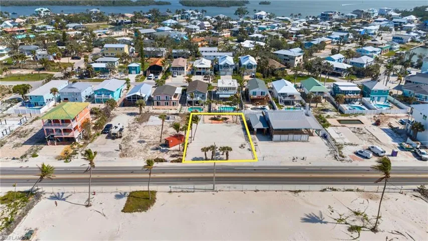 VIRTUALLY ENHANCED Bird's eye view with a water view and a residential view