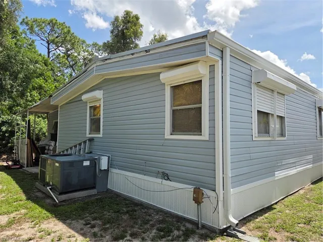 Electric storm shutters in front & back; manual shutters on sides.