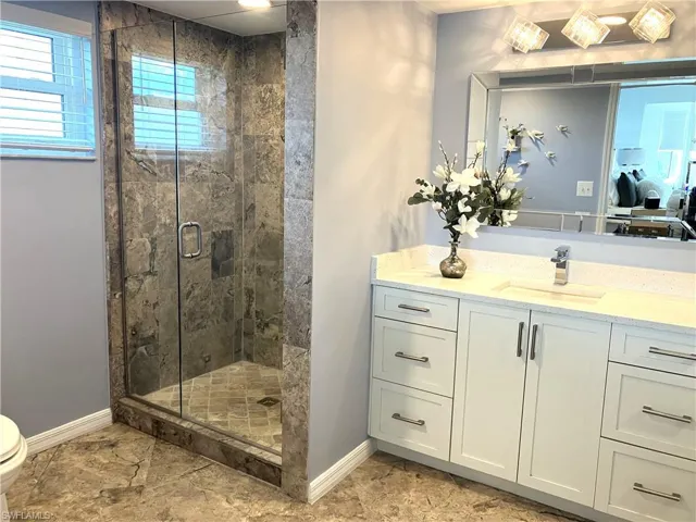 Gorgeous bathroom with Marble floors & shower!