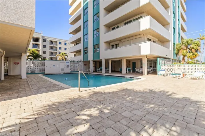 View of swimming pool with a patio