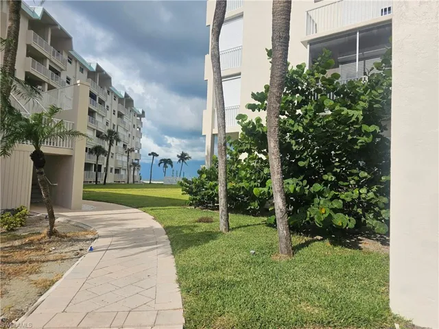 Surrounding community featuring a lawn