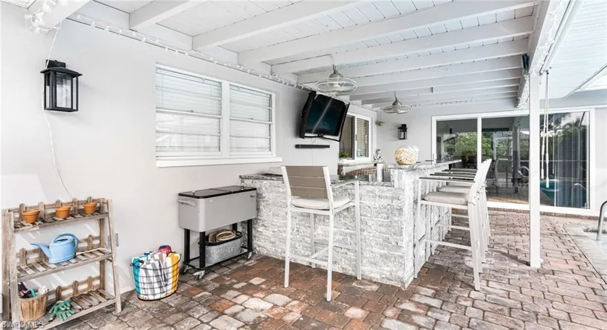 View of patio / terrace featuring a bar