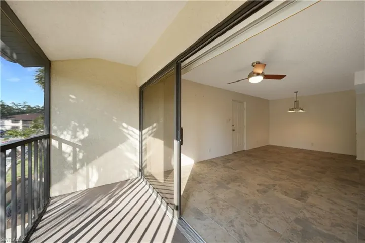 Balcony featuring ceiling fan