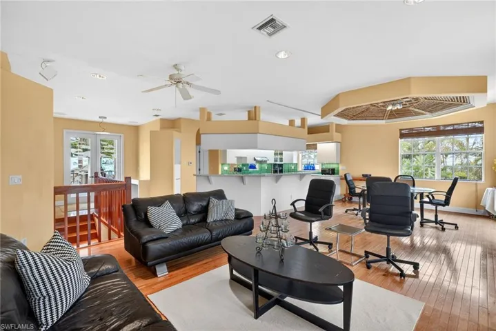 Open concept kitchen, dining and living area.