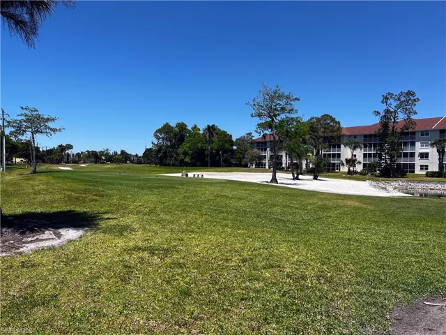 View of home's community featuring a lawn