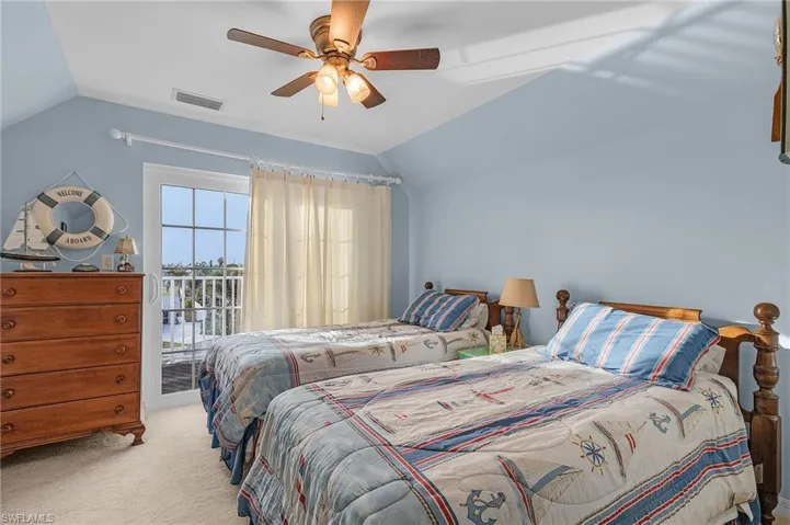 Guest bedroom #1 has an open deck.