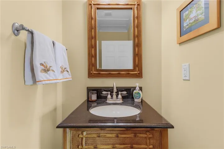 Guest half bath on the main living level.