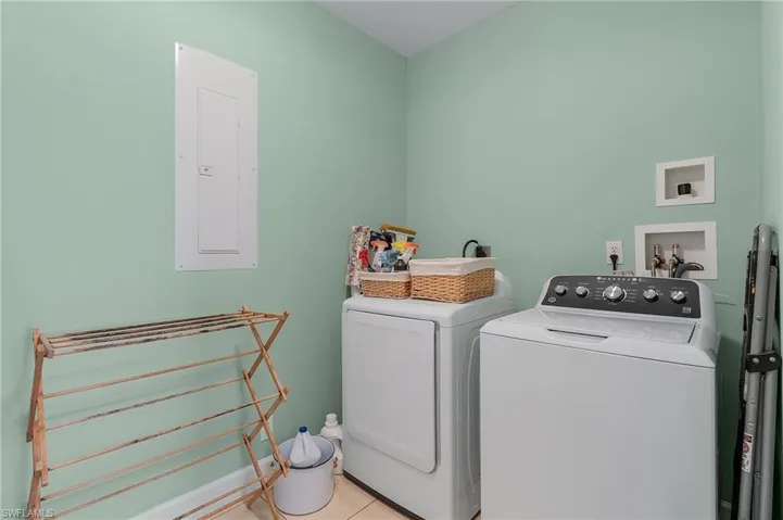 Laundry is conveniently located off of the kitchen and next to the elevator