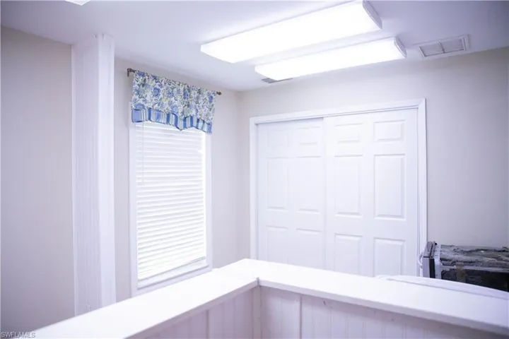 Unfurnished bedroom with a closet