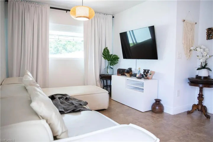 Bedroom featuring baseboards