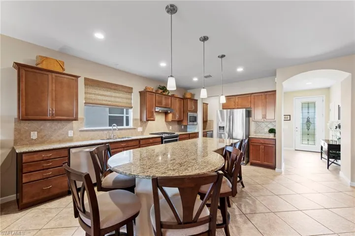 Kitchen has large island, and plenty of counter space