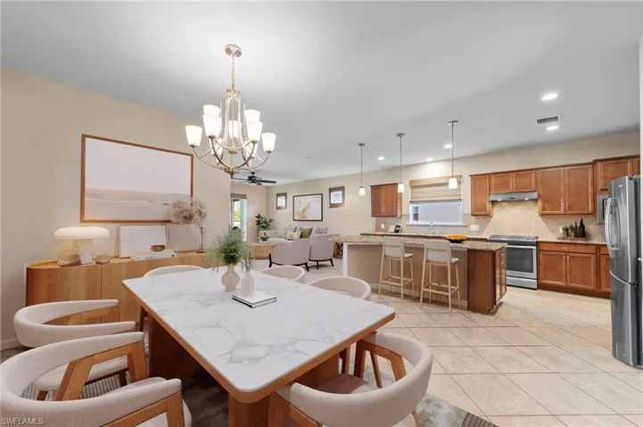 ***VIRTUALLY STAGED*** Dining area looking into Kitchen/Great Room