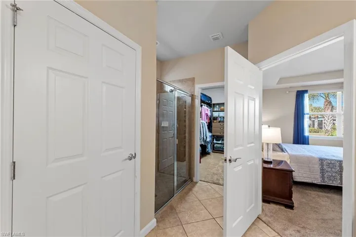 Shower to left by closet door